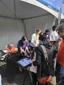 Sam demonstrating cyanotyping