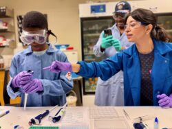 Tiffany teaches pipetting, while Dad takes some pics :)